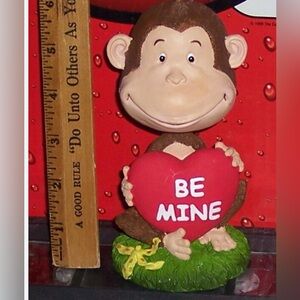 BD&A bobble head monkey
